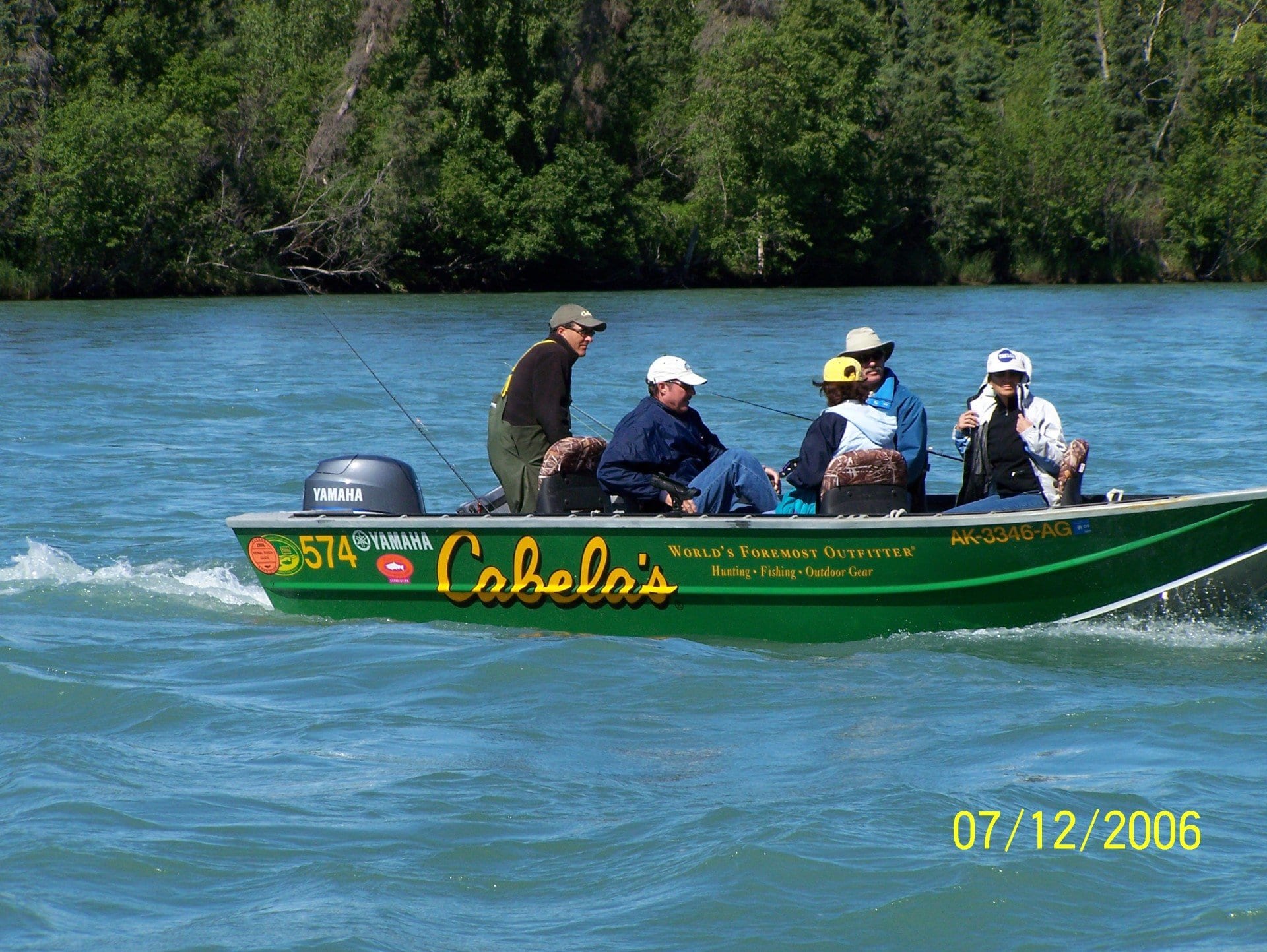 fisherman on motorboat