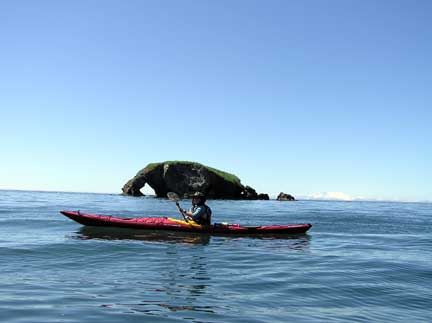 person kayaking in Alaska