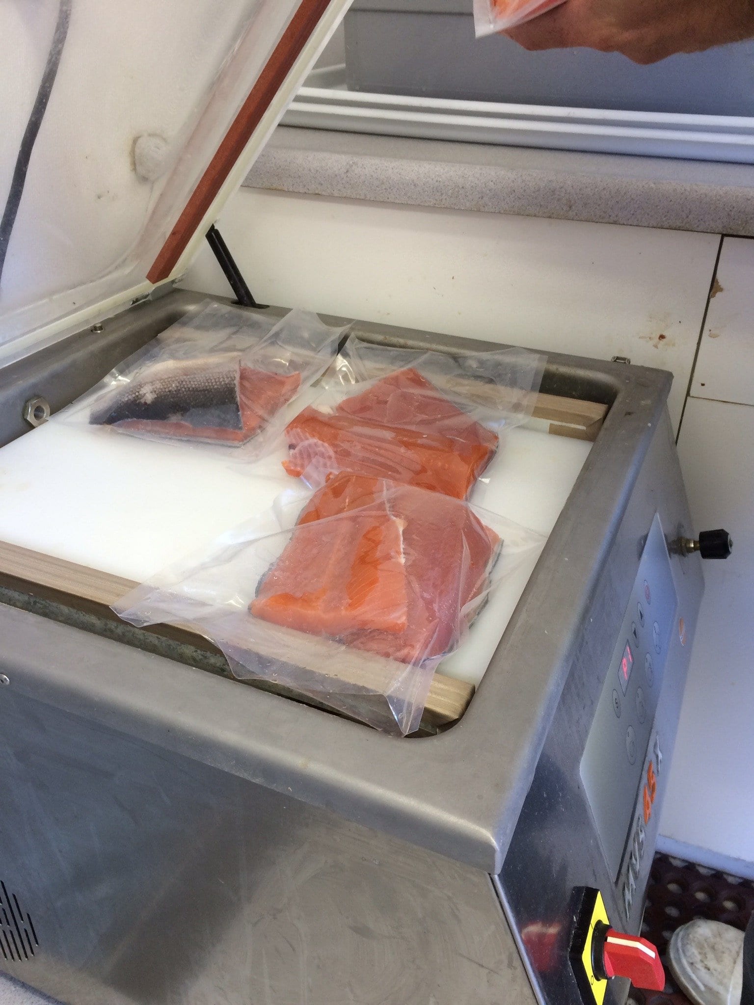 salmon filets being packaged