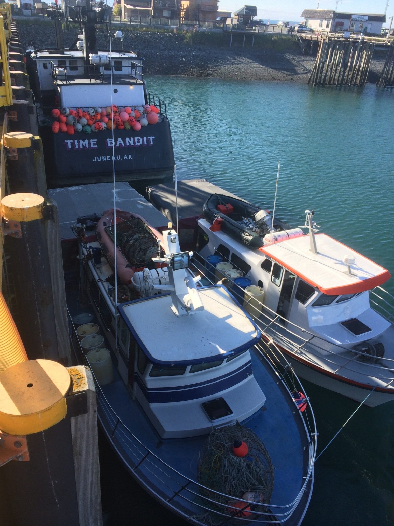 moored fishing boats with cabins