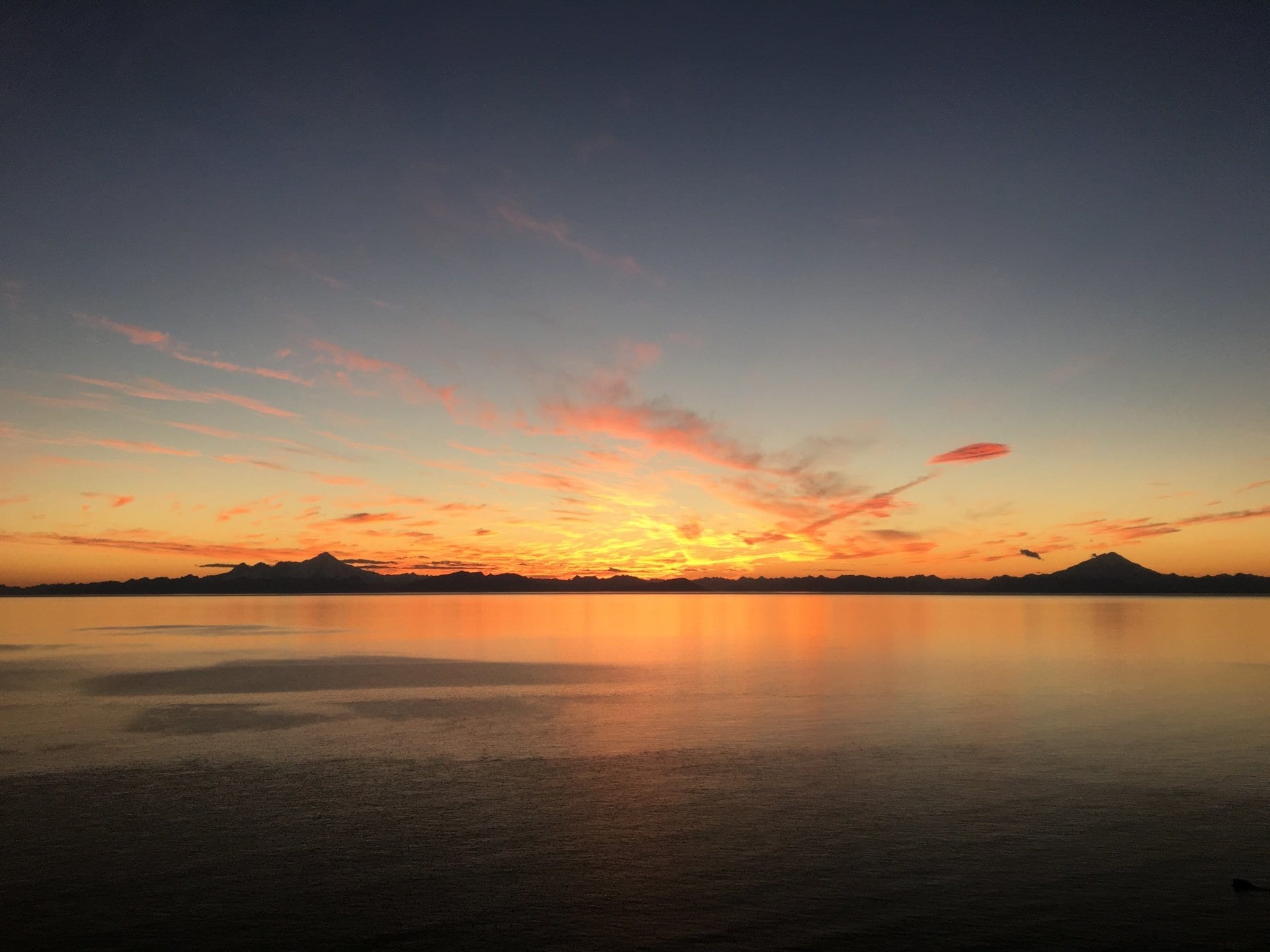 fiery sunset over the water