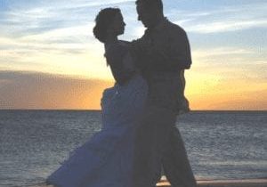 wedding couple dancing on Alaska beach