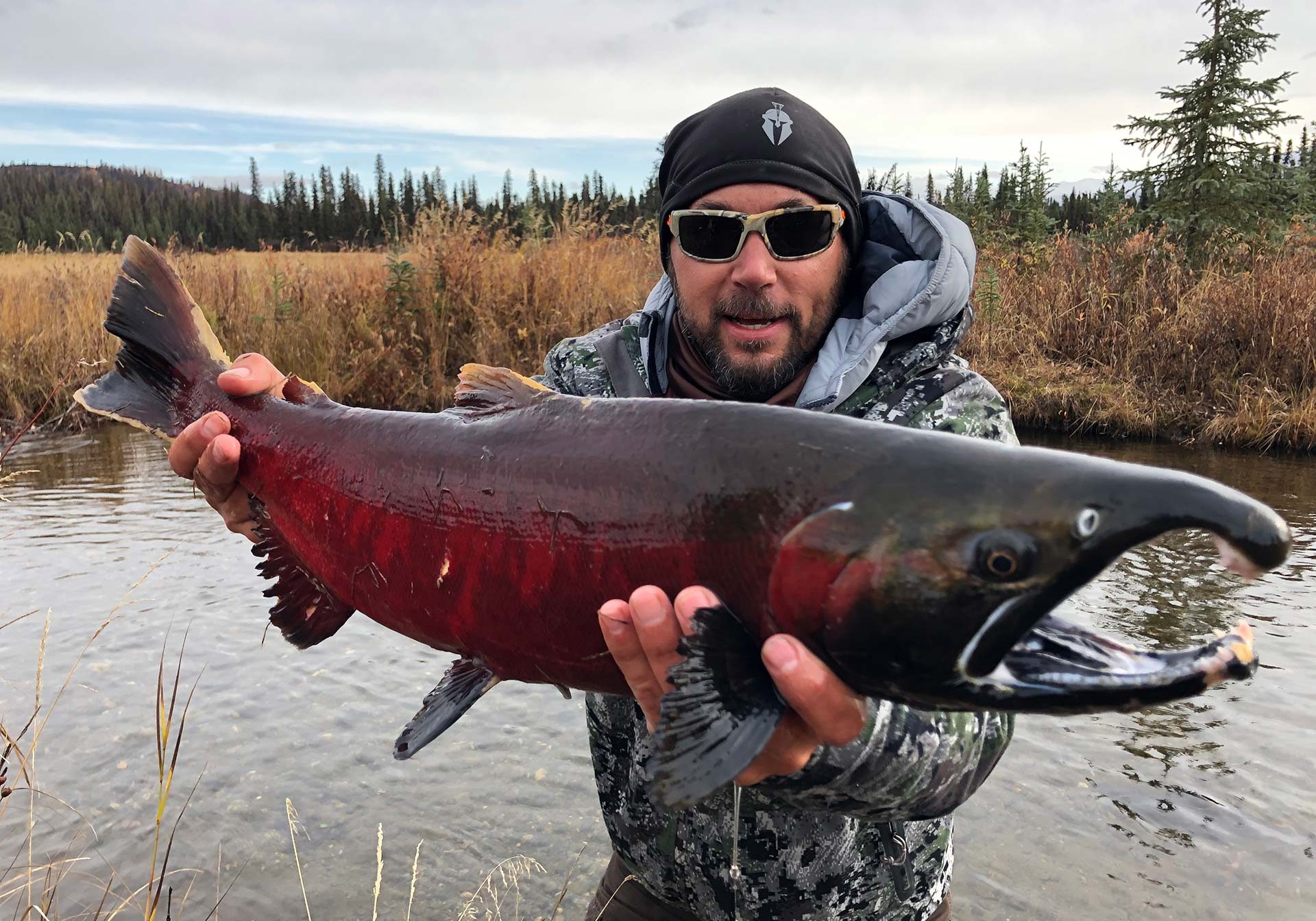 man holding salmon