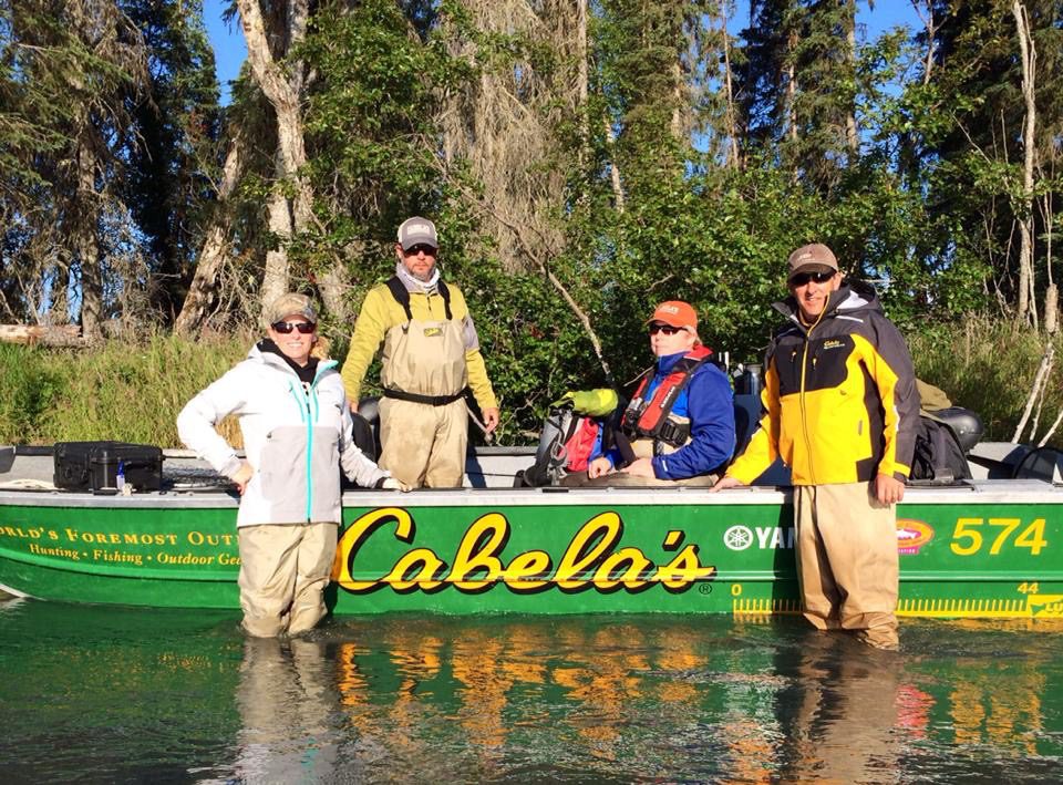 alaska fly fishing river anglers in front of a Cabelas boat