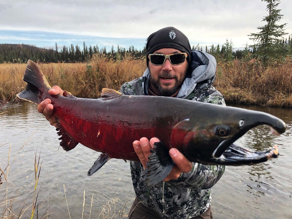 man holding salmon